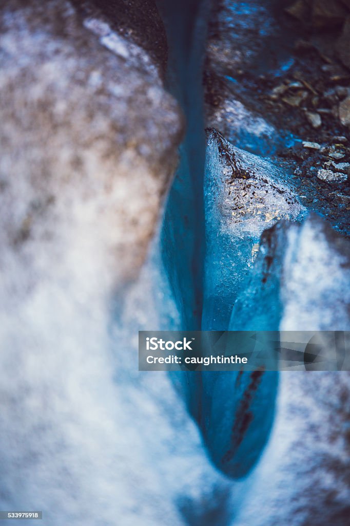 glacier crevasse glacier crevasse in gleaming blue cyan turquoise Adventure Stock Photo