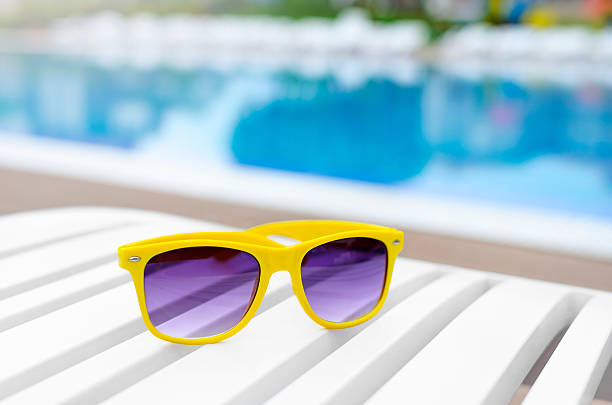 istock Sunglasses on a sun lounger. 533977358