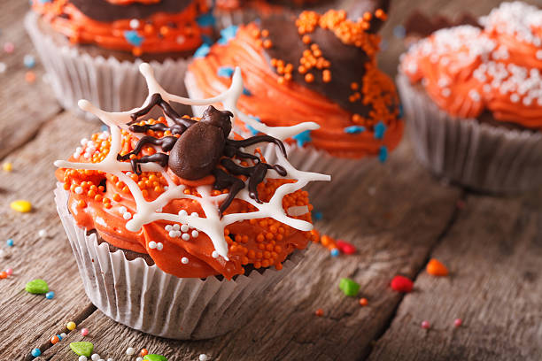 istock Halloween cupcakes decorated with chocolate spider close-up 533977750
