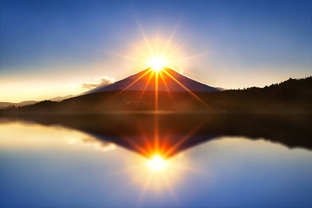 Diamond Fuji Mount fuji with diamond by lens flare on the top at Lake kawaguchiko in morning. mt. fuji photos stock pictures, royalty-free photos & images