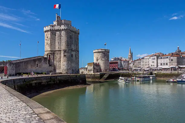 The port of La Rochelle on the coast of the Poitou-Charentes region of France. The towers date from the 11th century.