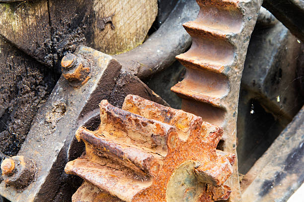 istock Close up of rusted cogs on a lock gate 533979298
