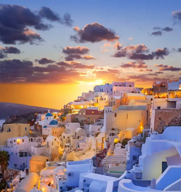 Santorini sunset over the village of Oia in Greece