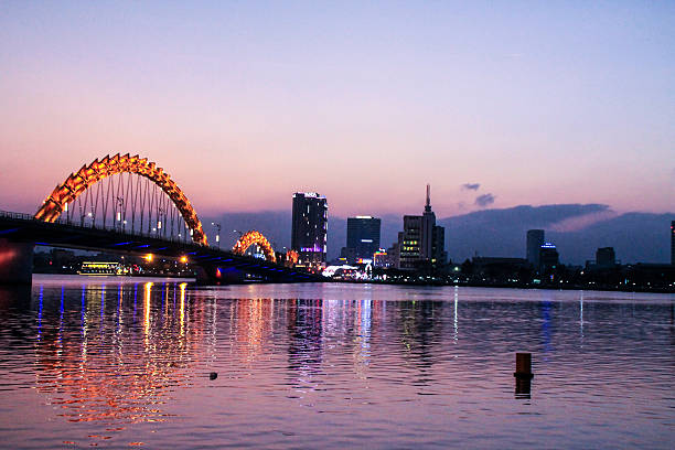 istock Da Nang dragon bridge during afternoon commute over sunset. 533981770