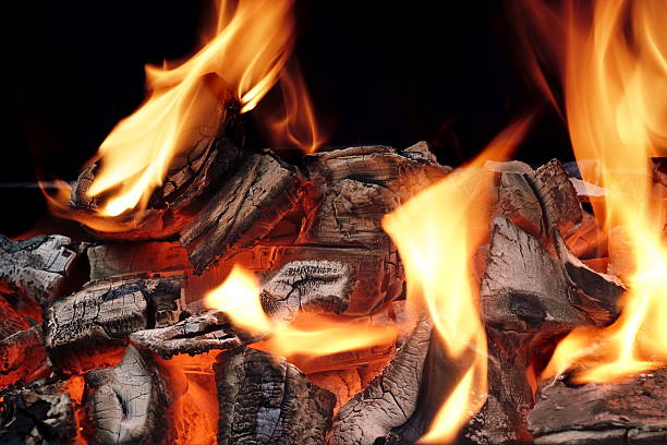istock Flaming Charcoal Isolated On Black Background 533981992