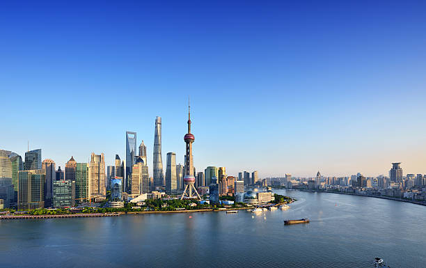 Shanghai Skyline Shanghai skyline in blue sky at sunset. shanghai tower stock pictures, royalty-free photos & images