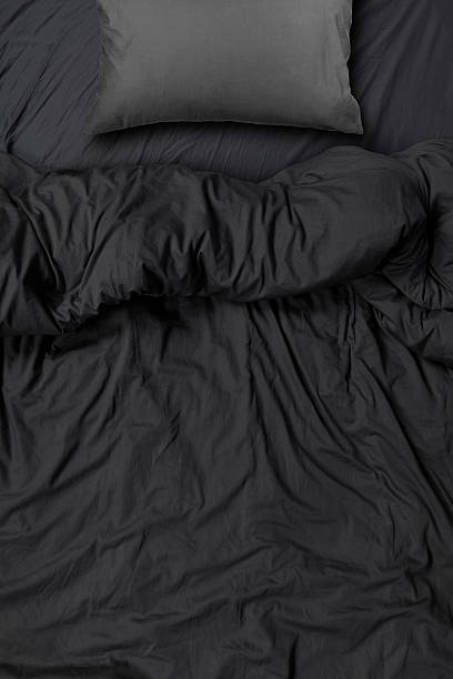 istock studio shot of bedding sheets and  pillow 533989084