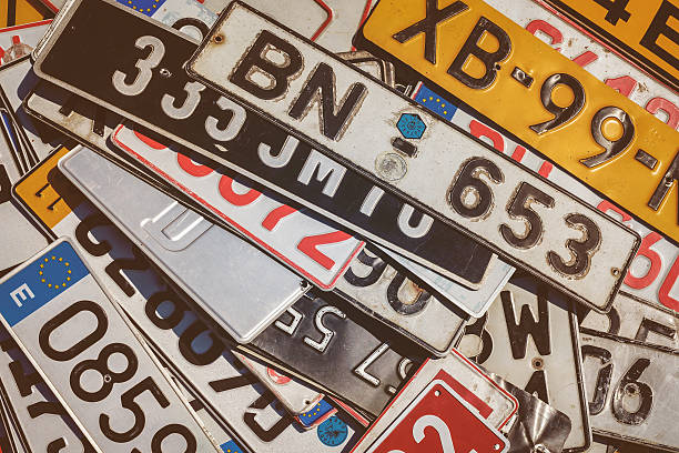 Vintage European car license plates Rosmalen, The Netherlands - May 8, 2016: Vintage European car license plates on a flee market in Rosmalen, The Netherlands vehicle accessory stock pictures, royalty-free photos & images