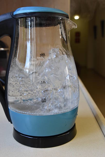 istock glass electric kettle with boiling water inside 533990954