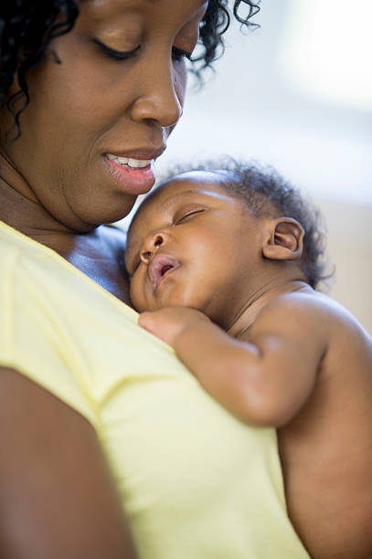 istock Newborn Lying on His Mother's Chest 533991724