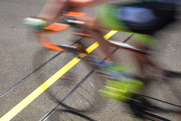 istock Cyclist reaching the goal line competing on a race 533993646