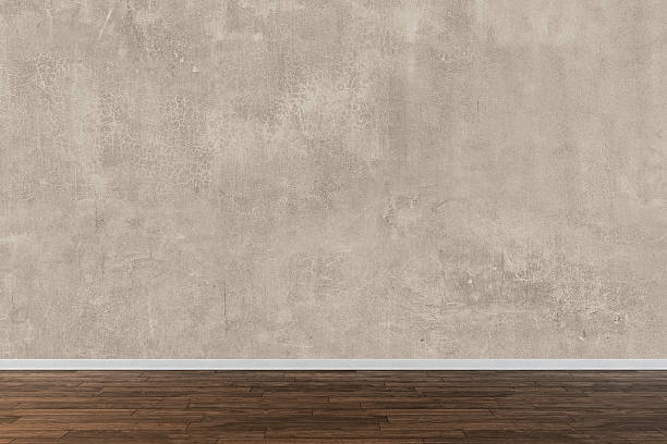 istock Concrete wall background on hardwood floor 533994144