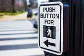 Push button to cross road crosswalk sign