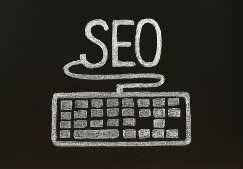 Chalk SEO concept with keyboard, drawn by hand not in photoshop