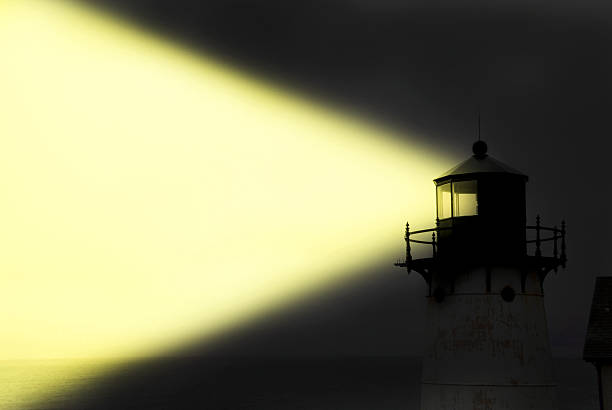 light house sonnenschein gelbe lichtstrahl in der nacht. - sea sign direction beacon stock-fotos und bilder