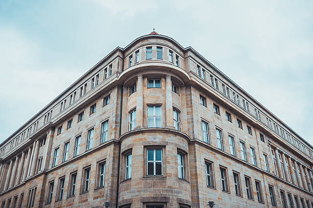 istock Low angle view of apartment building on cloudy day 533996094