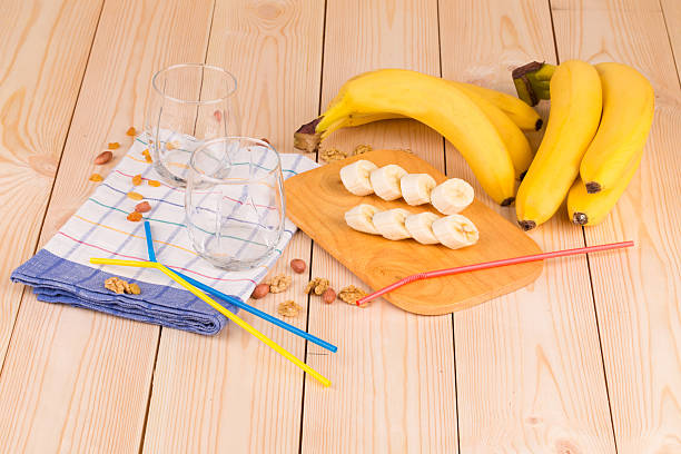 istock Banana composition on wooden board. 533996590