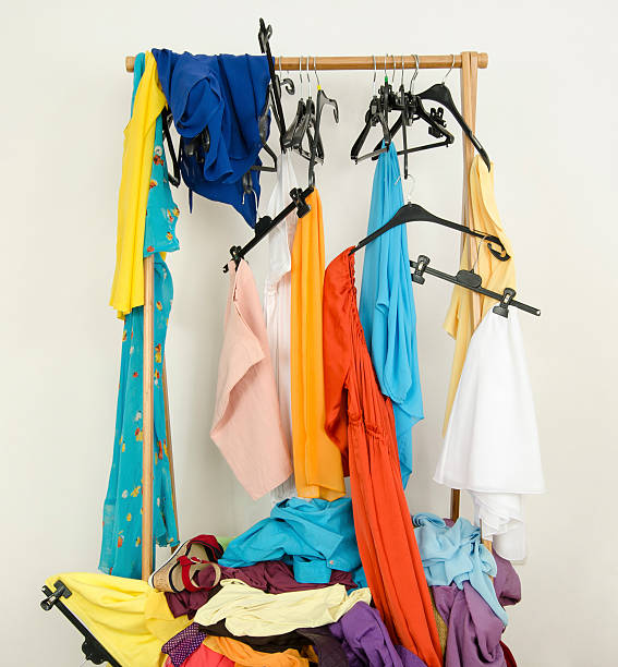 istock Messy rack of clothes and hangers. 533998201