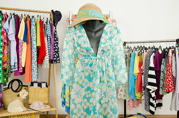 istock Wardrobe with clothes and a beach outfit on a mannequin. 533998221