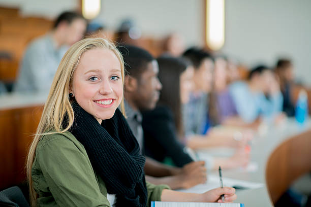 istock Young Woman Taking Notes in School 533999388