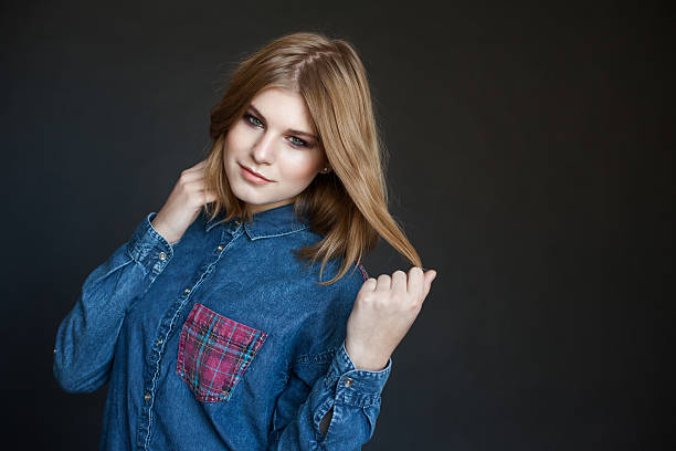 istock portrait of a beautiful young model in denim jacket 533999611