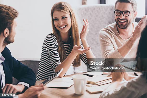 Sharing The Latest News Stock Photo - Download Image Now - Meeting, Casual Clothing, Business Meeting