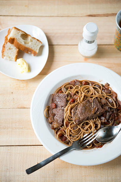 istock Delicious steak pasta on wooden table 534000015