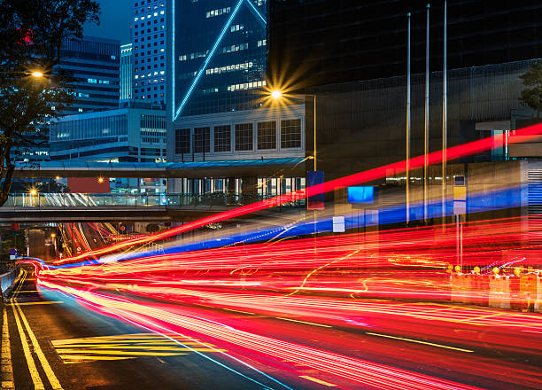 istock light trails in the downtown district,hongkong 534000406