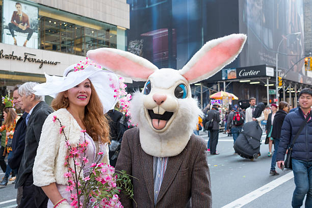New York, United States - March 27, 2016: New York's Easter Parade displays creative hats and bonnets outside St. Patrick's Cathedral during Easter celebrations. 