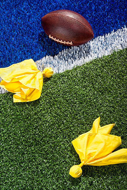 istock Penalty Flags around a football at the end zone. 534001449