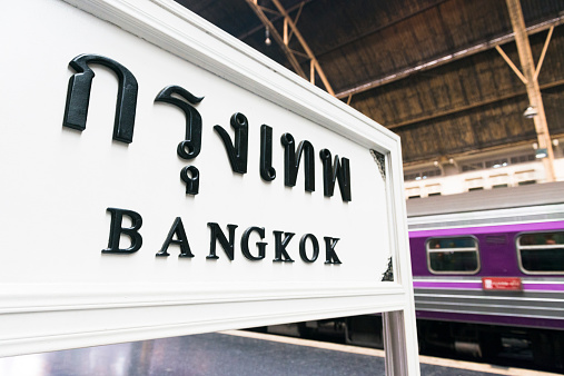 In Bangkok, Thailand historic Hua Lamphong railway station is the main hub to catch trains. A sign with both English and Thai says Bangkok. Photographed with a Nikon D800.