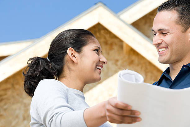 istock Couple holding a blueprint 534002537