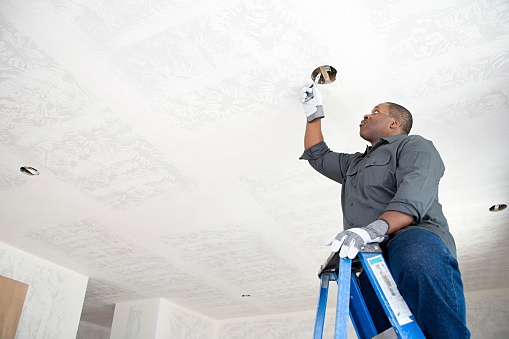 An electrician fixing wires