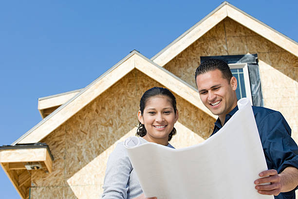 Couple looking at a blueprint