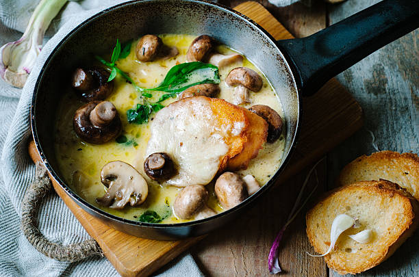 istock Melting mozzarella in pan with mushrooms, basil and garlic croutons 534004368