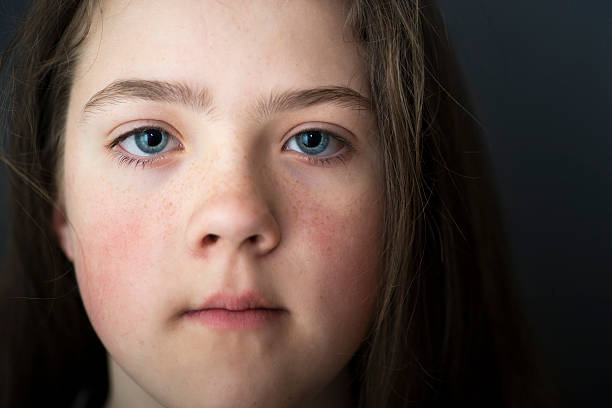 istock girl face closeup 534004682