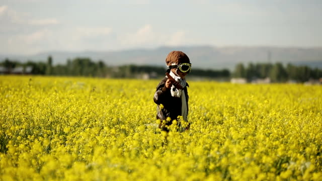 Young Boy wearing Jetpack is Taking Off