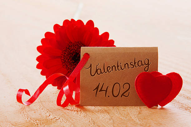 istock Red Gerber and love hearts. 534024583