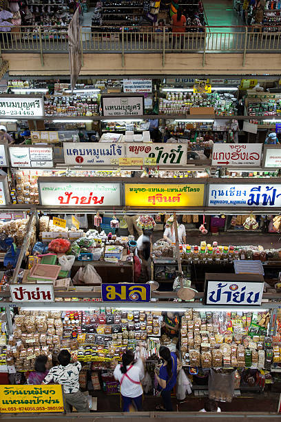 Warorot Market (Kad Luang) Chiang Mai, Thailand - August 21, 2012: Warorot Market in the afternoon during a tourist low-season period (rainy season). warorot stock pictures, royalty-free photos & images