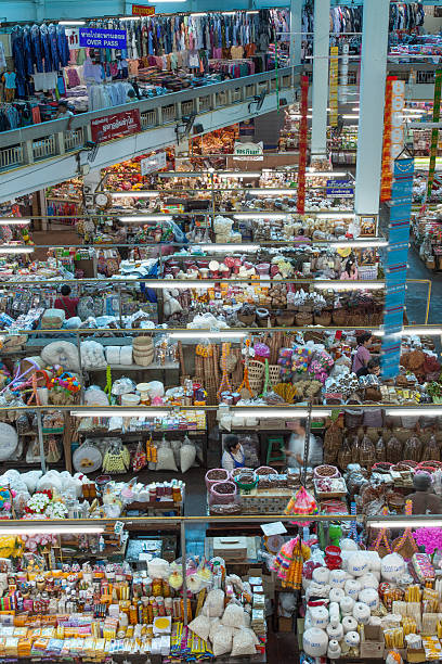 Warorot Market (Kad Luang) Chiang Mai, Thailand - August 21, 2012: Warorot Market in the afternoon during a tourist low-season period (rainy season). warorot stock pictures, royalty-free photos & images
