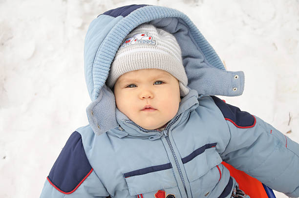 istock Little baby in winter overall 534028415
