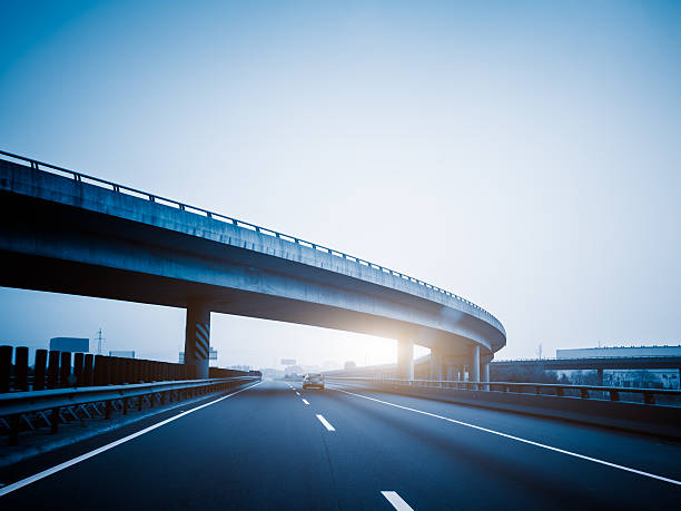 istock car driving on the highway 534028528