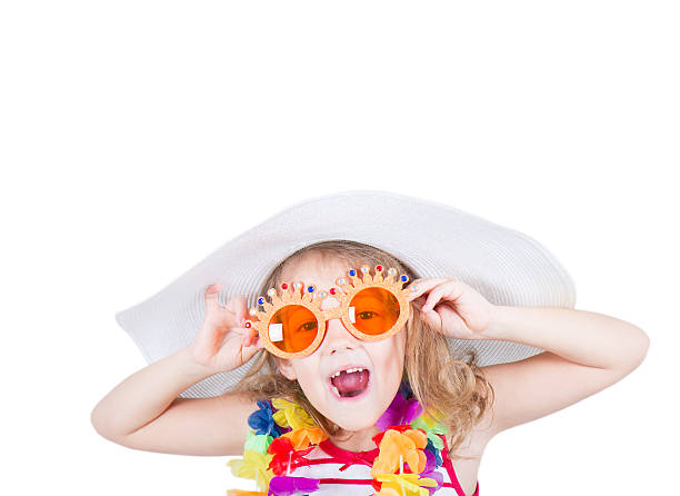 mischievous little girl with sunglasses stock photo