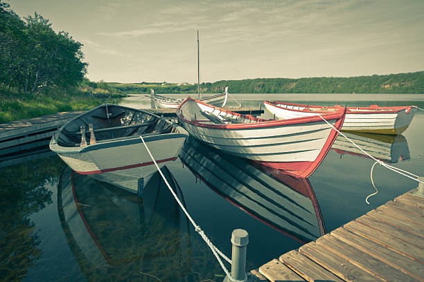 istock Floating Wooden Boats with Paddles 534029109