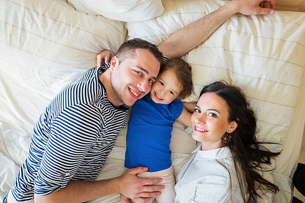 istock Parents having fun with their cute little daughter 534029734