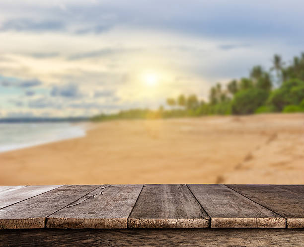 istock Summer sandy beach with wooden planks 534031454