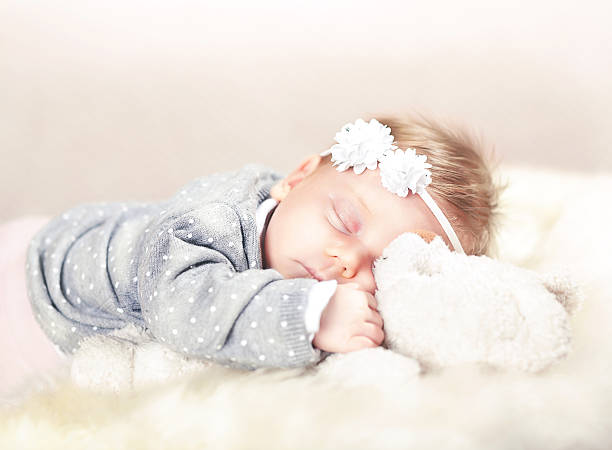 istock sleeping femal baby 534033252