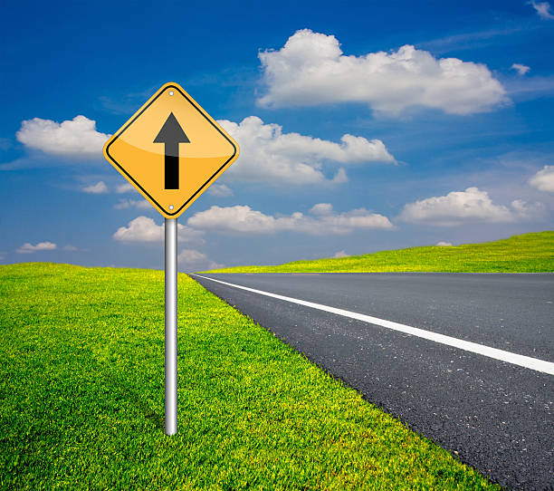 istock traffic sign pole beside asphalt road 534033887