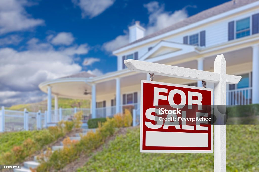 Home For Sale Real Estate Sign and House Home For Sale Real Estate Sign and Beautiful New House. 2015 Stock Photo