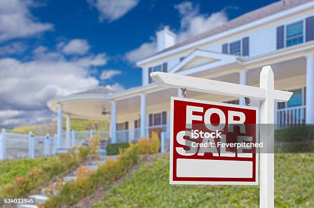 Home For Sale Real Estate Sign And House Stock Photo - Download Image Now - 2015, Banking, Blue